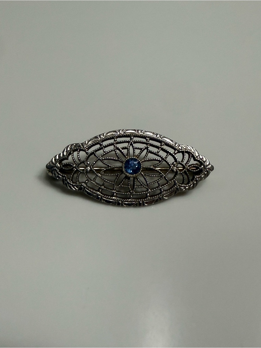 Vintage 14kt White and Old Gold Filigree Brooch with Blue Stone